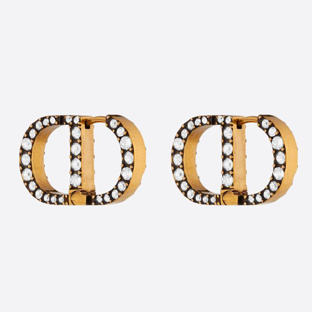 Close-up of Dior Women 30 Montaigne Earrings antique gold with white crystals