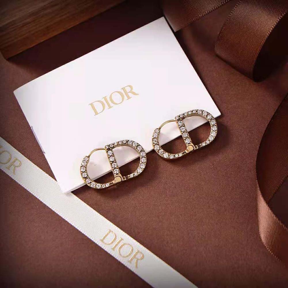 Detail of white crystals sparkling on Dior Women 30 Montaigne Earrings