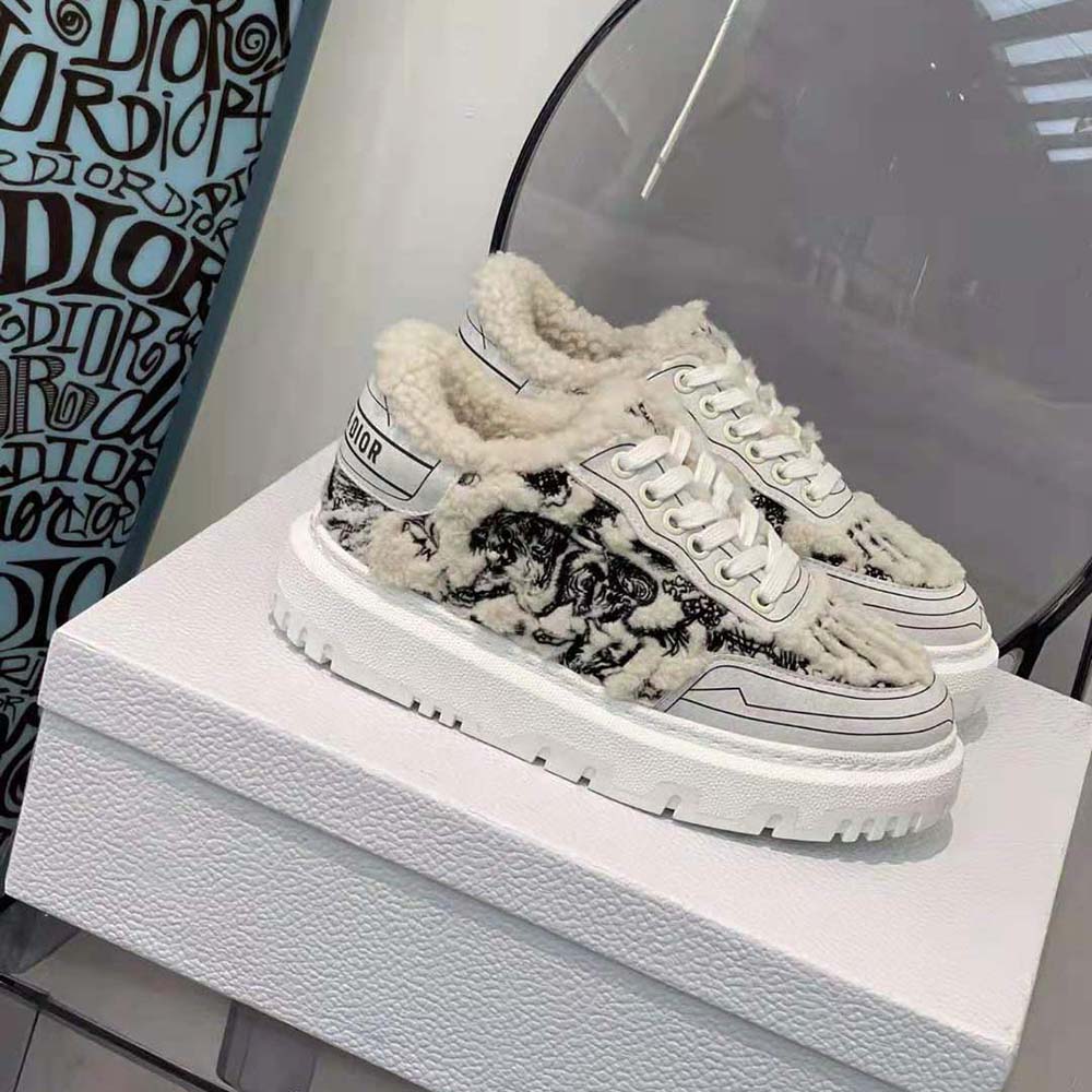 Close-up of Dior Women Addict Sneaker embroidery and shearling detail