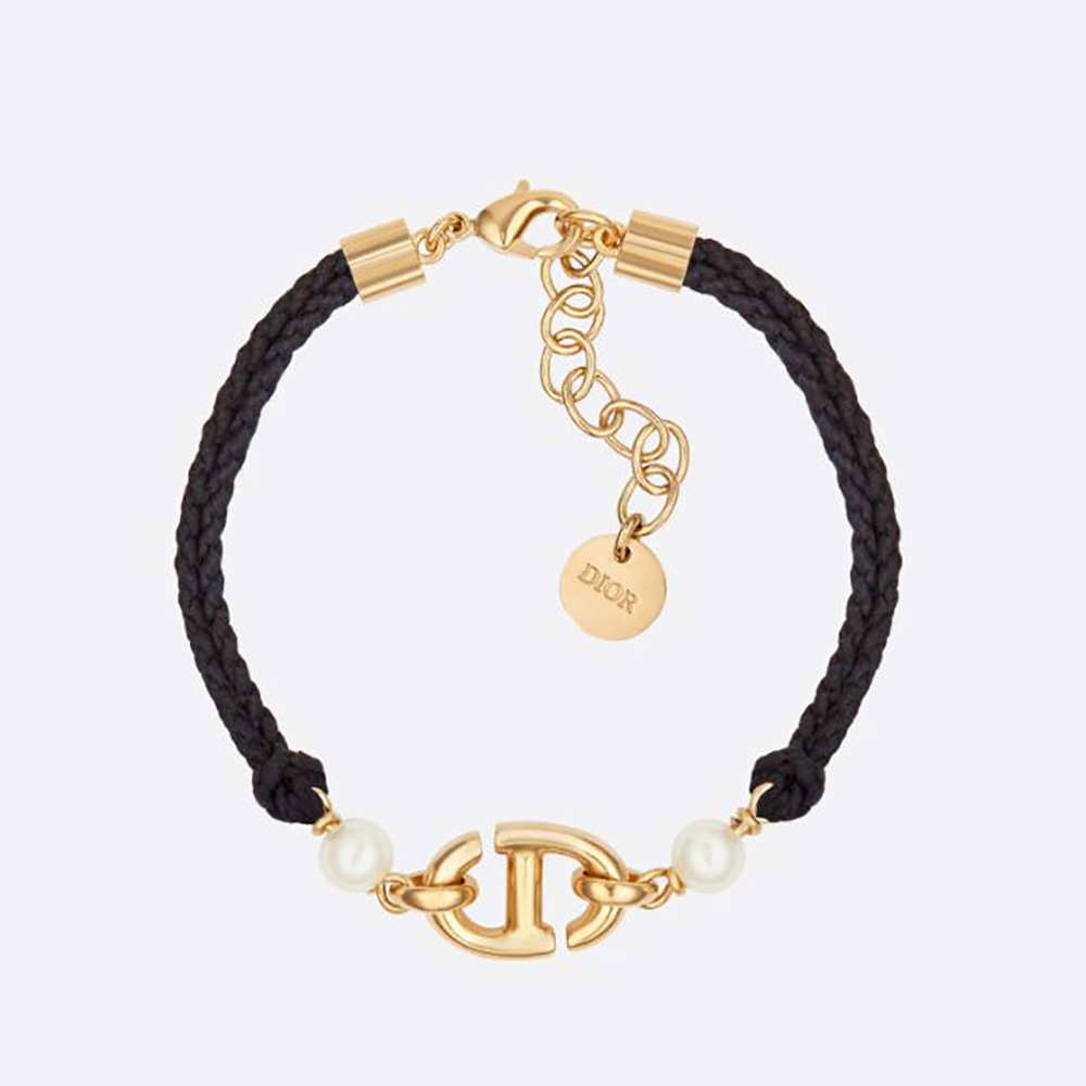 Close-up of Dior Women CD Navy Bracelet showing gold-finish metal and pearls