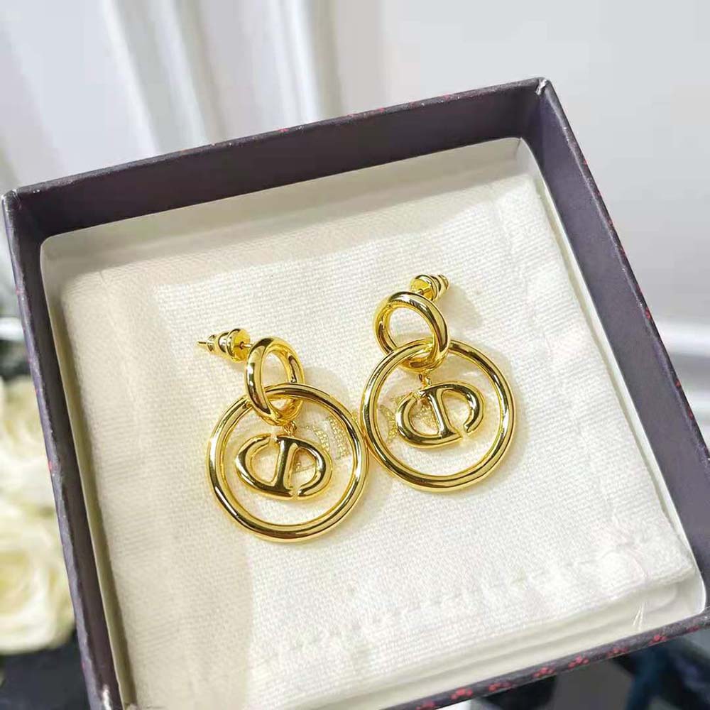 Side angle highlighting sleek silhouette of Dior Women CD Navy Earrings Gold-Finish Metal