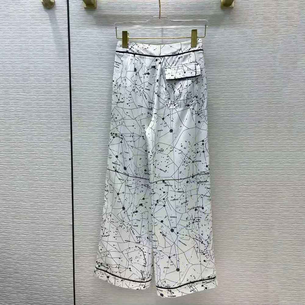 Side angle showing tailored fit of Dior Women Chez Moi Pants