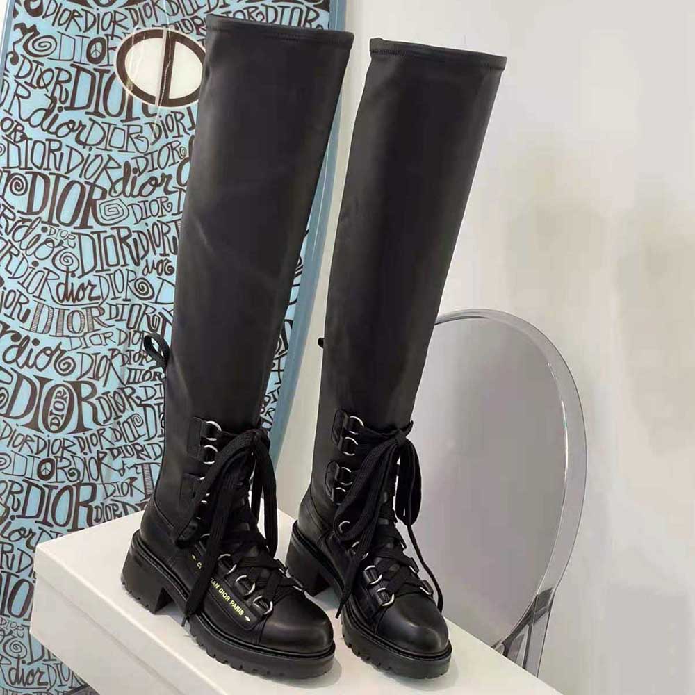 Detail shot of smooth black lambskin texture on Dior Women D-Doll Thigh Boot