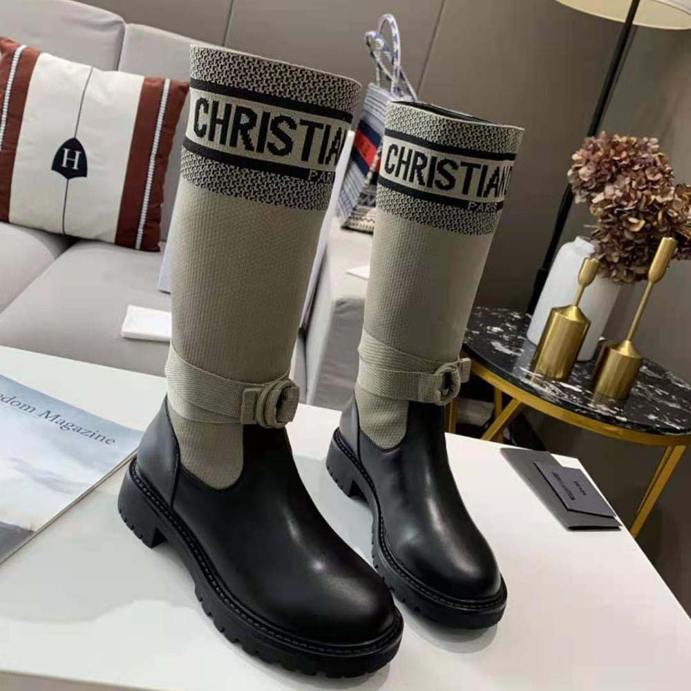 Close-up of signature Dior D-major hardware on boot