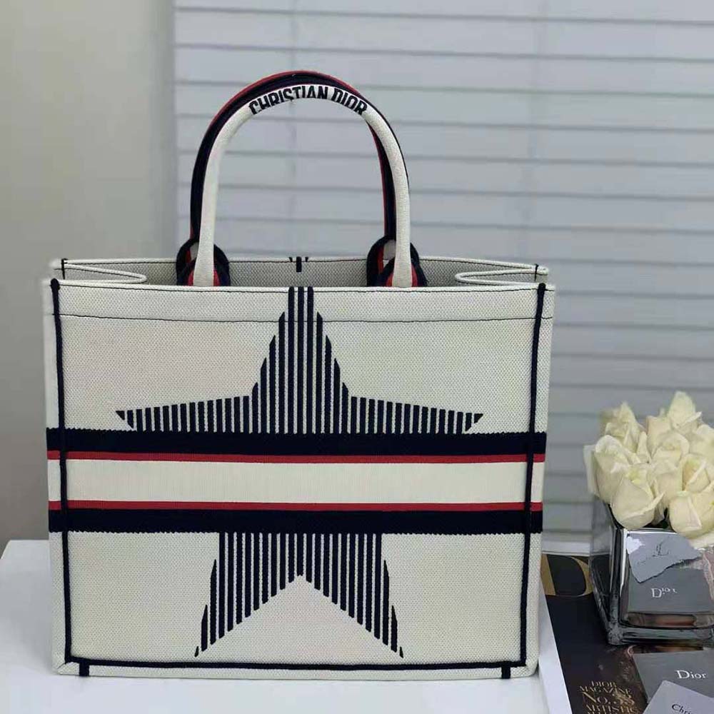Side angle showing silver hardware on Dior Women Dioralps Dior Book Tote