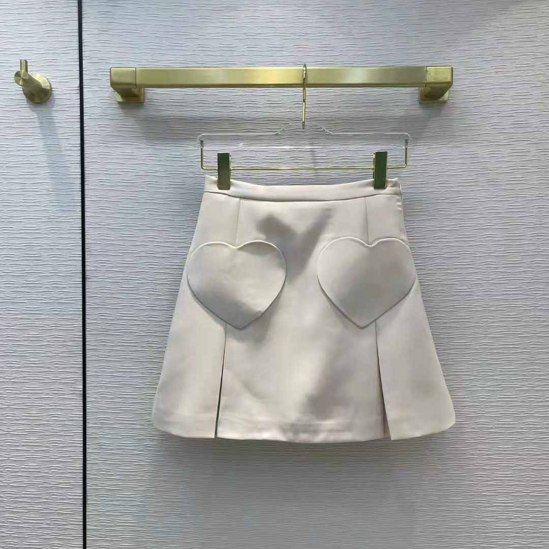 Close-up detail of heart-shaped pockets on Dior Women Dioramour Miniskirt