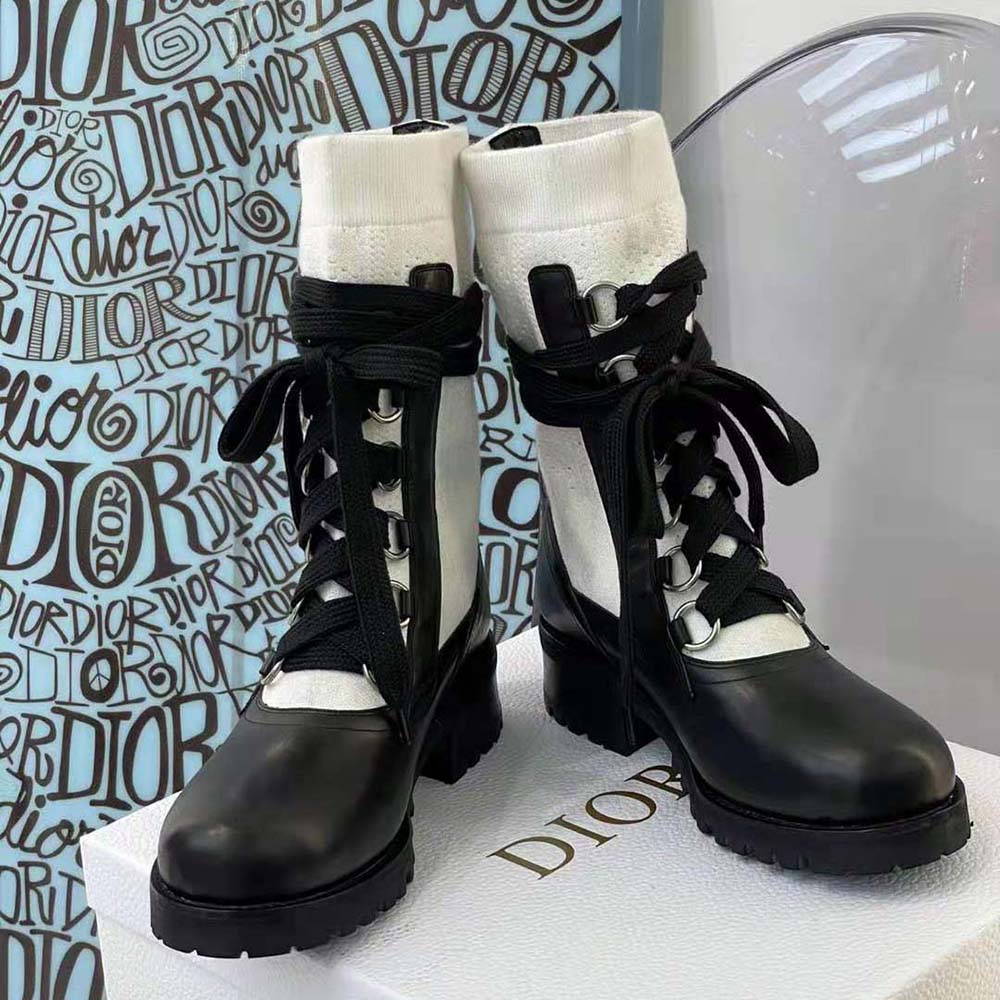 Close-up on silver-tone eyelets of Dior Women Diorland Lace-up Boot