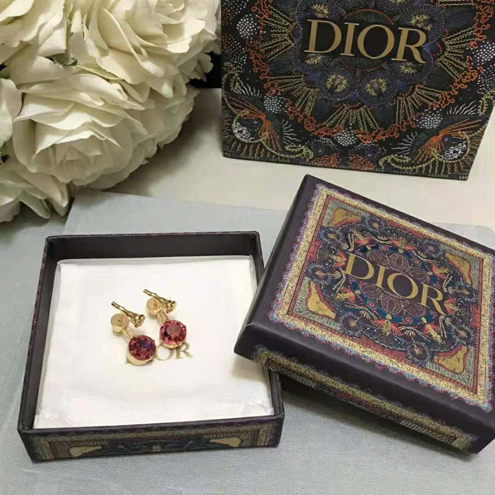 Side view of Dior Women Dream Earrings gold-finish metal shine