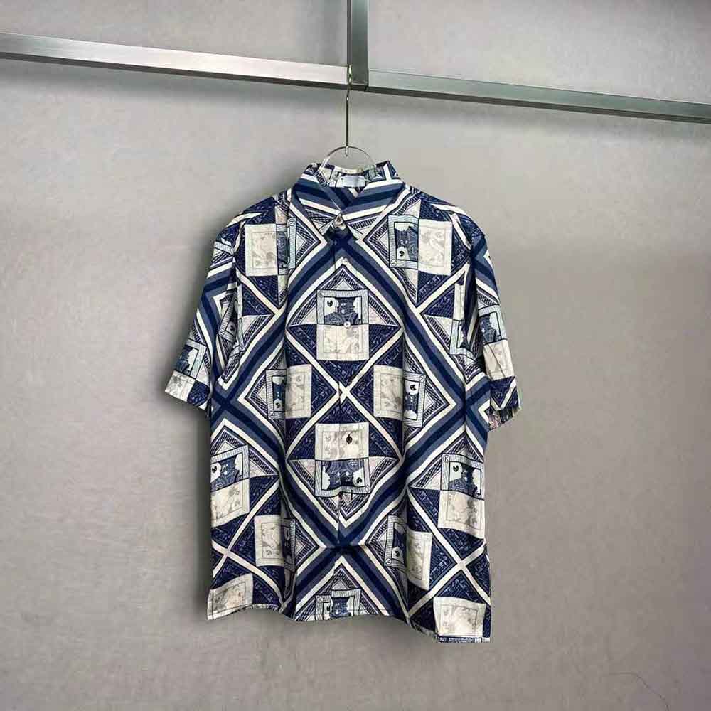 Close-up of signature graphic print on Dior Kenny Scharf silk shirt