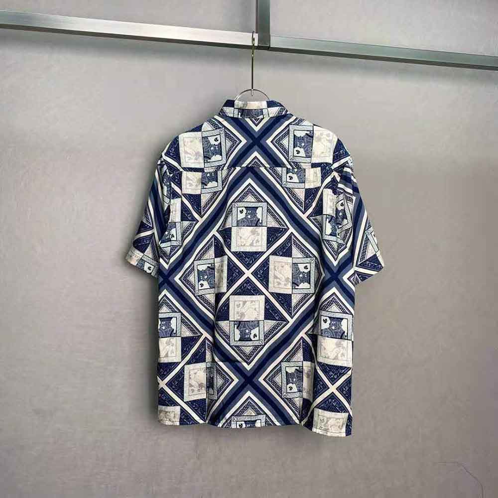 Side angle showing relaxed fit of Dior Women Kenny Scharf silk twill shirt
