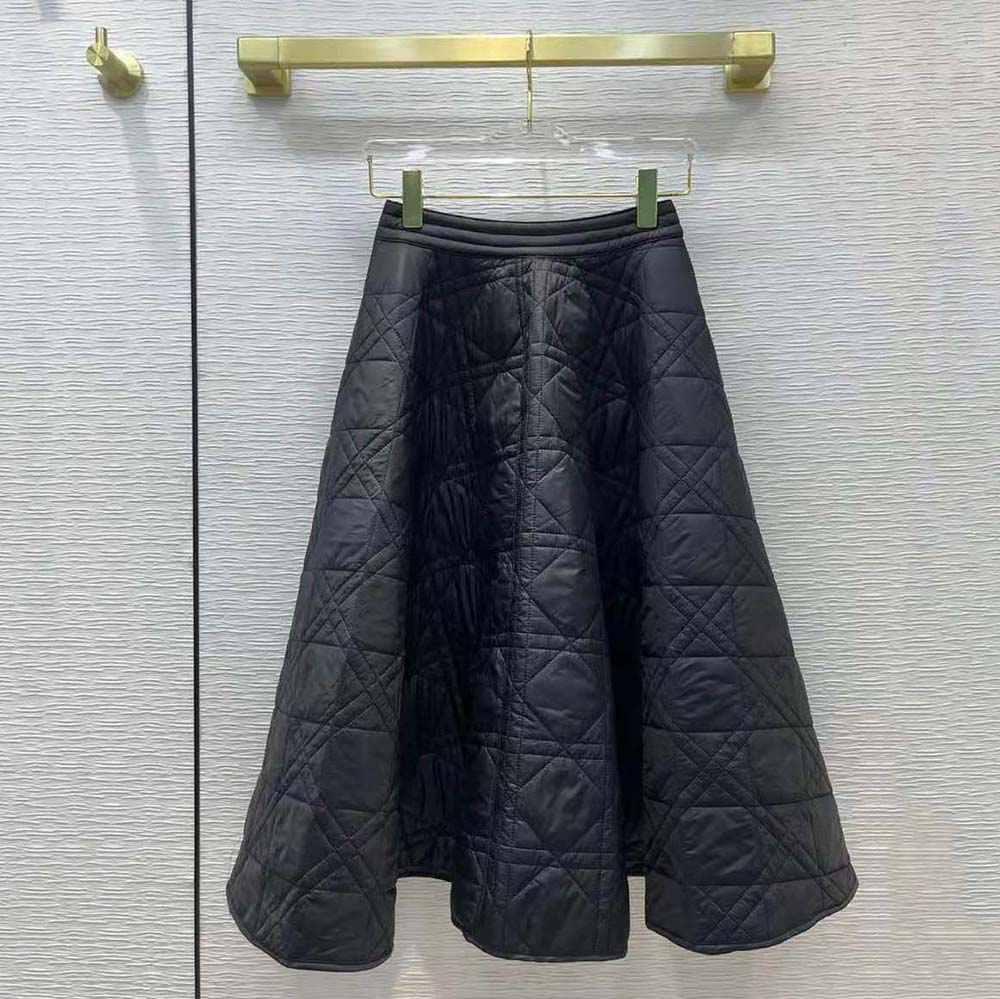 Side angle showing shape and fabric texture of Dior Mid-Length skirt