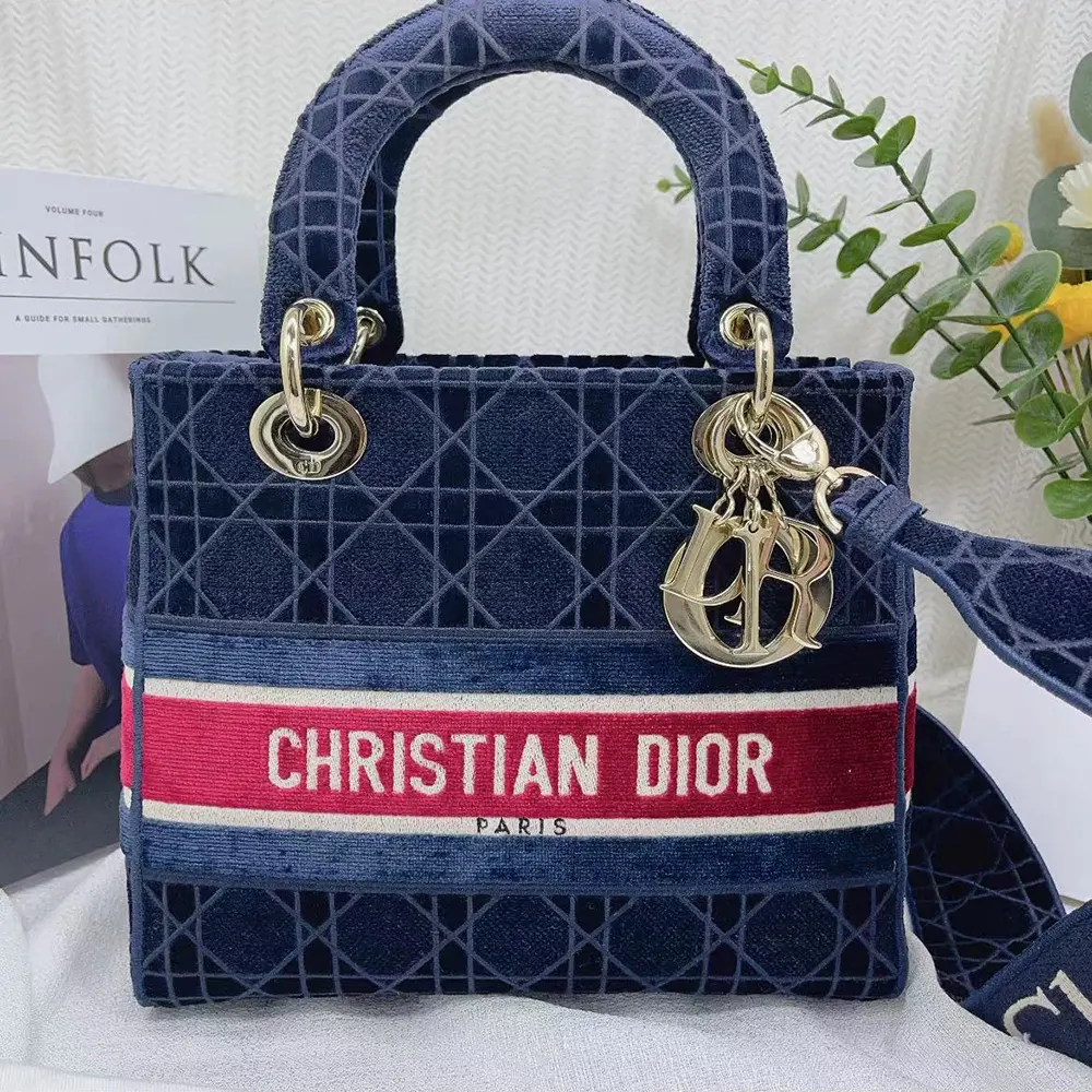 Close-up detail of blue velvet and cannage embroidery on Dior Lady D-lite Bag