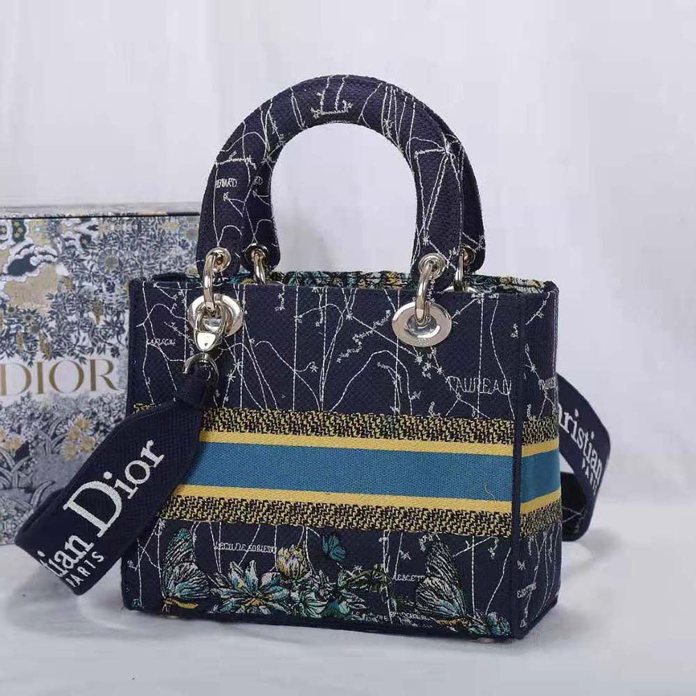 Side angle showing silver hardware and flap closure on Dior Women Medium Lady D-lite Bag