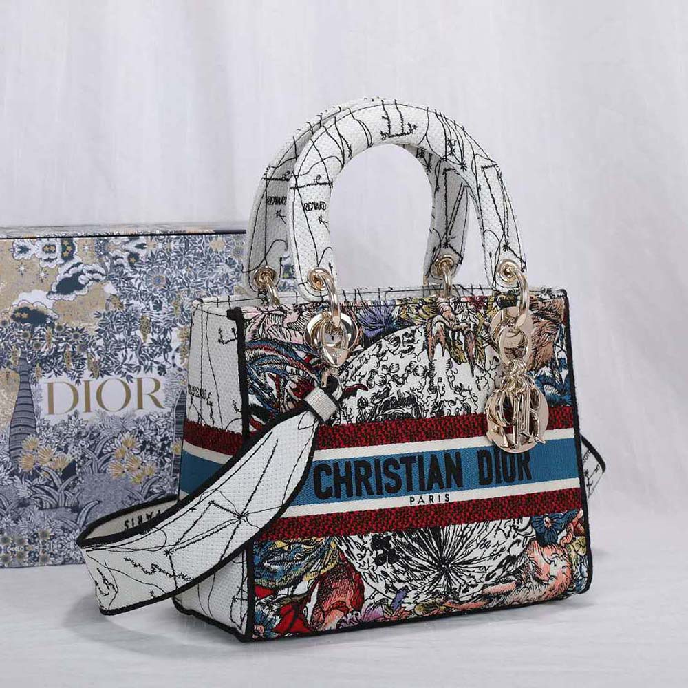 Side profile showing latte leather accents on Dior Women Medium Lady D-lite Bag