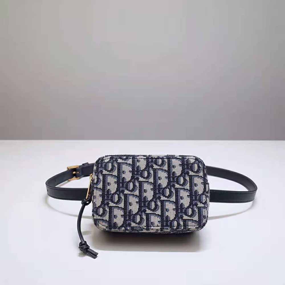 Close-up of blue Dior Oblique jacquard fabric on belt pouch