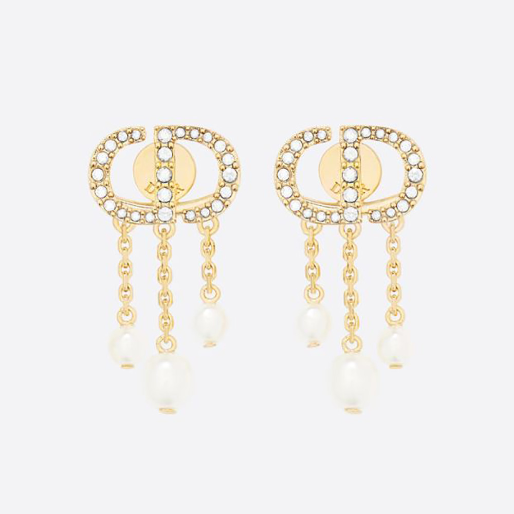Close-up of Dior Women Petit CD Earrings gold finish and white pearls