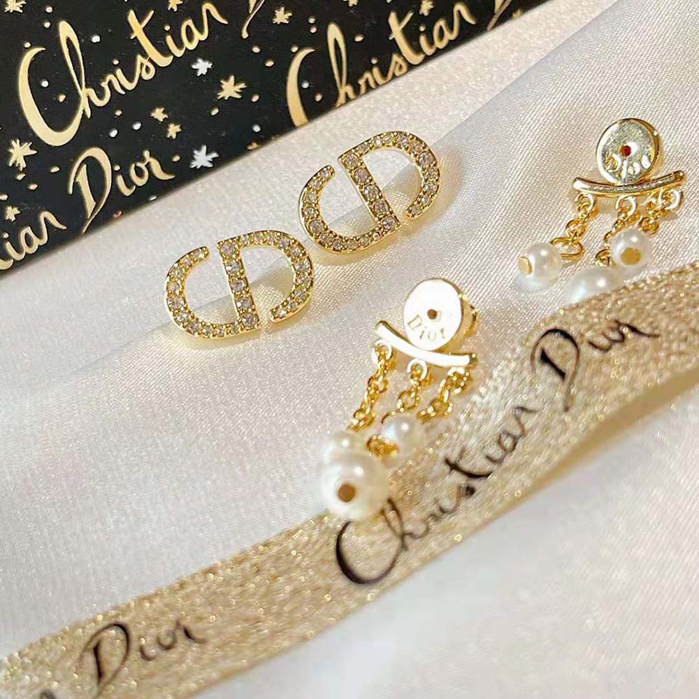 Front view of Dior Women Petit CD Earrings elegant petite silhouette