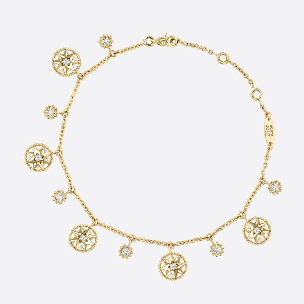 Close-up of Dior Women Rose Des Vents bracelet showing diamonds and mother-of-pearl