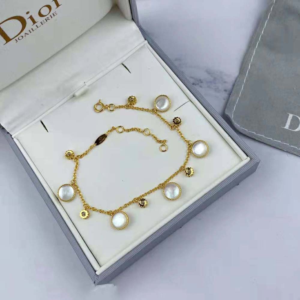 Dior Women Rose Des Vents bracelet draped on wrist highlighting adjustable closure