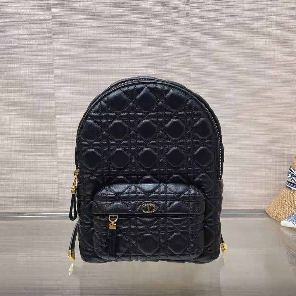 Close-up of Cannage quilting and silver clasp on small Dior backpack