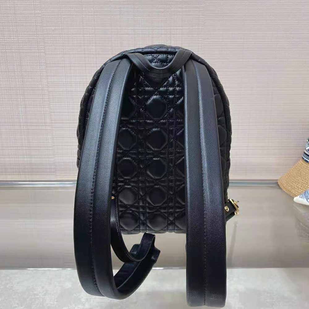 Side angle showing compact silhouette of Dior Women Small Dior Backpack