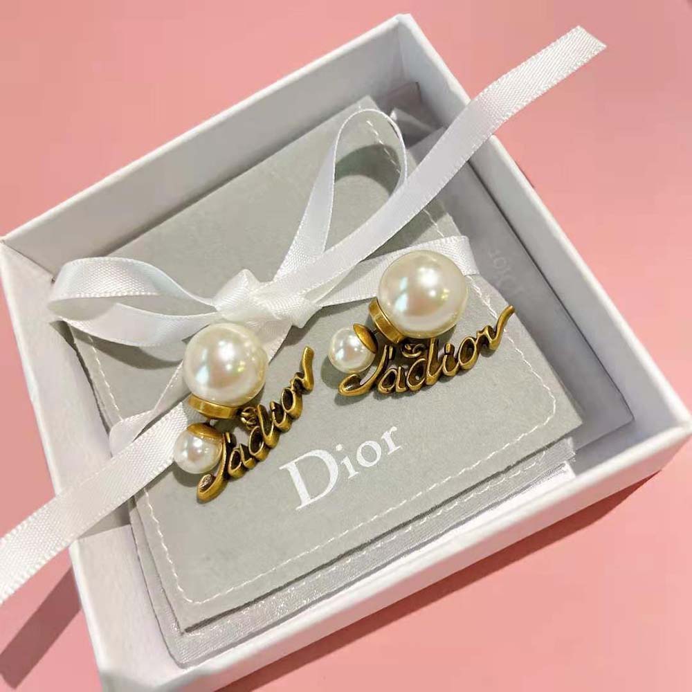 Side profile showing Dior Women Tribales Earrings double-sided design