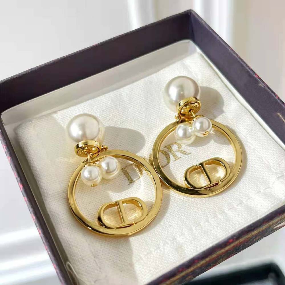 Close-up detail of white resin pearls on Dior Women Tribales Earrings