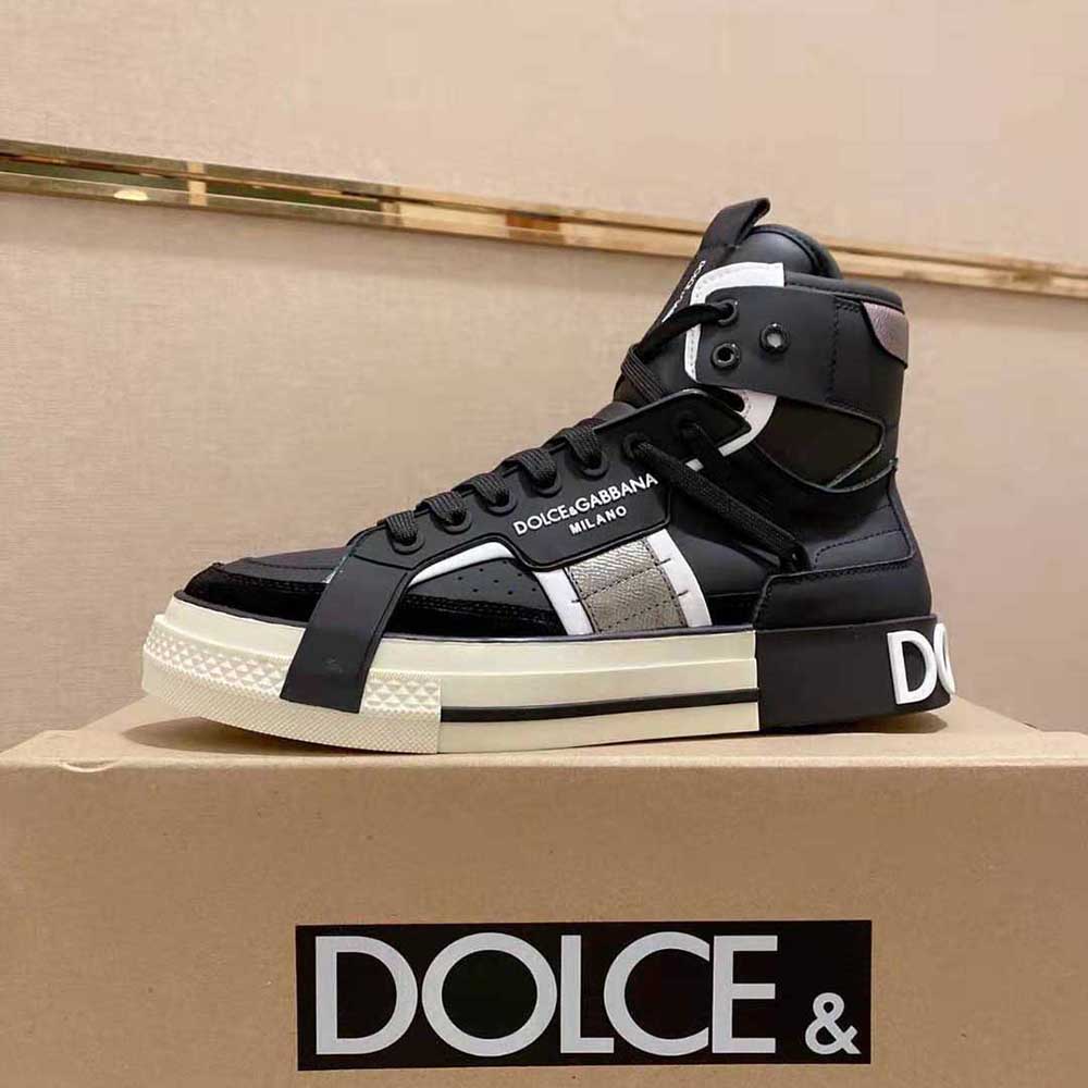 Close-up of black calfskin and contrasting detail on Dolce Gabbana D&G high-top sneakers