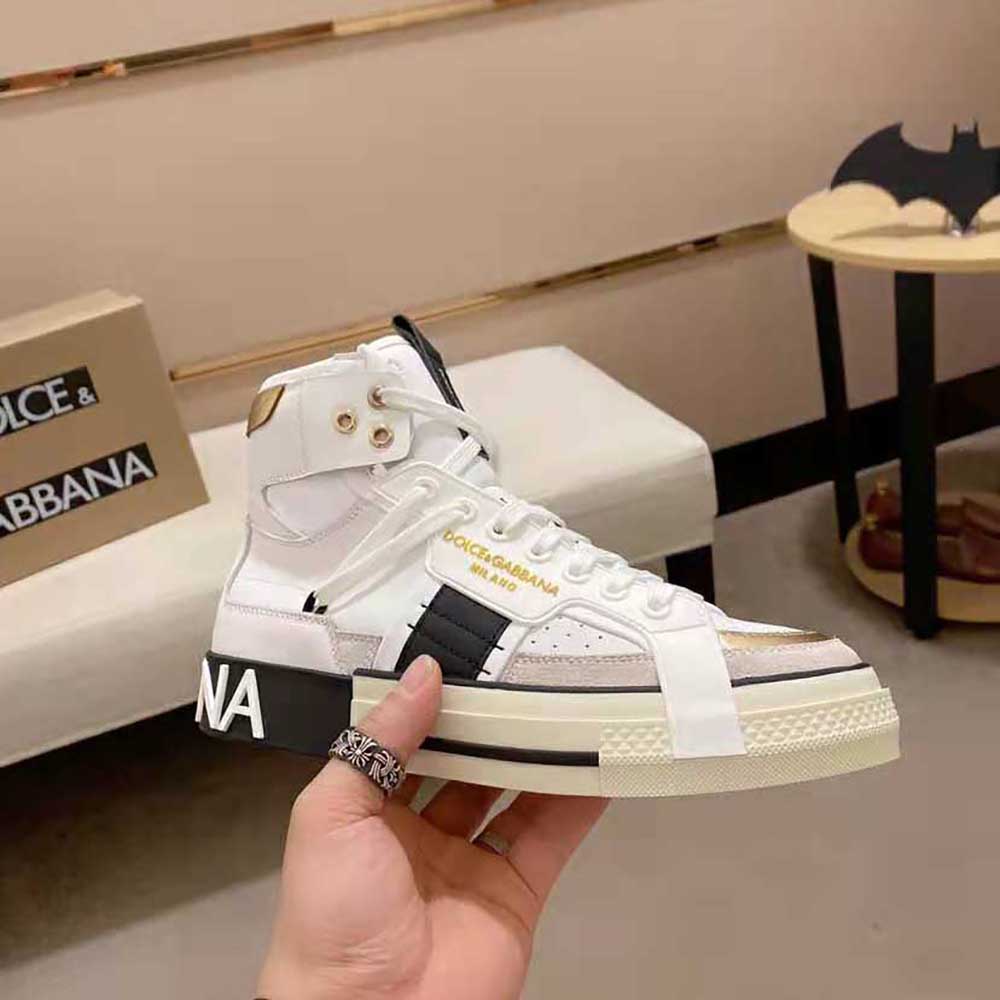 Top view showing silhouette and branded hardware of Dolce Gabbana D&G white sneakers