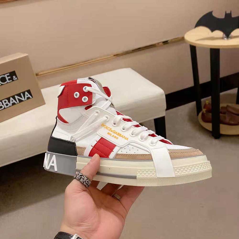 Top-down angle showing laces and signature hardware on Dolce Gabbana D&G sneakers