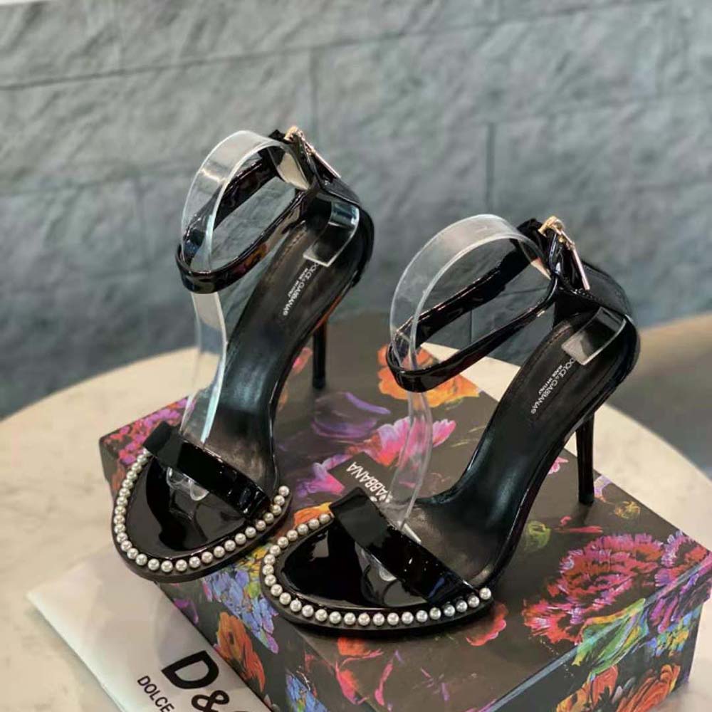 Top angle showing buckle and glossy finish of Dolce Gabbana D&G Women Patent Leather Sandals
