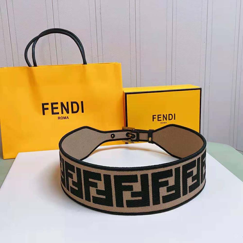 Side angle showing adjustable holes on Fendi Women Canvas High Waist Belt