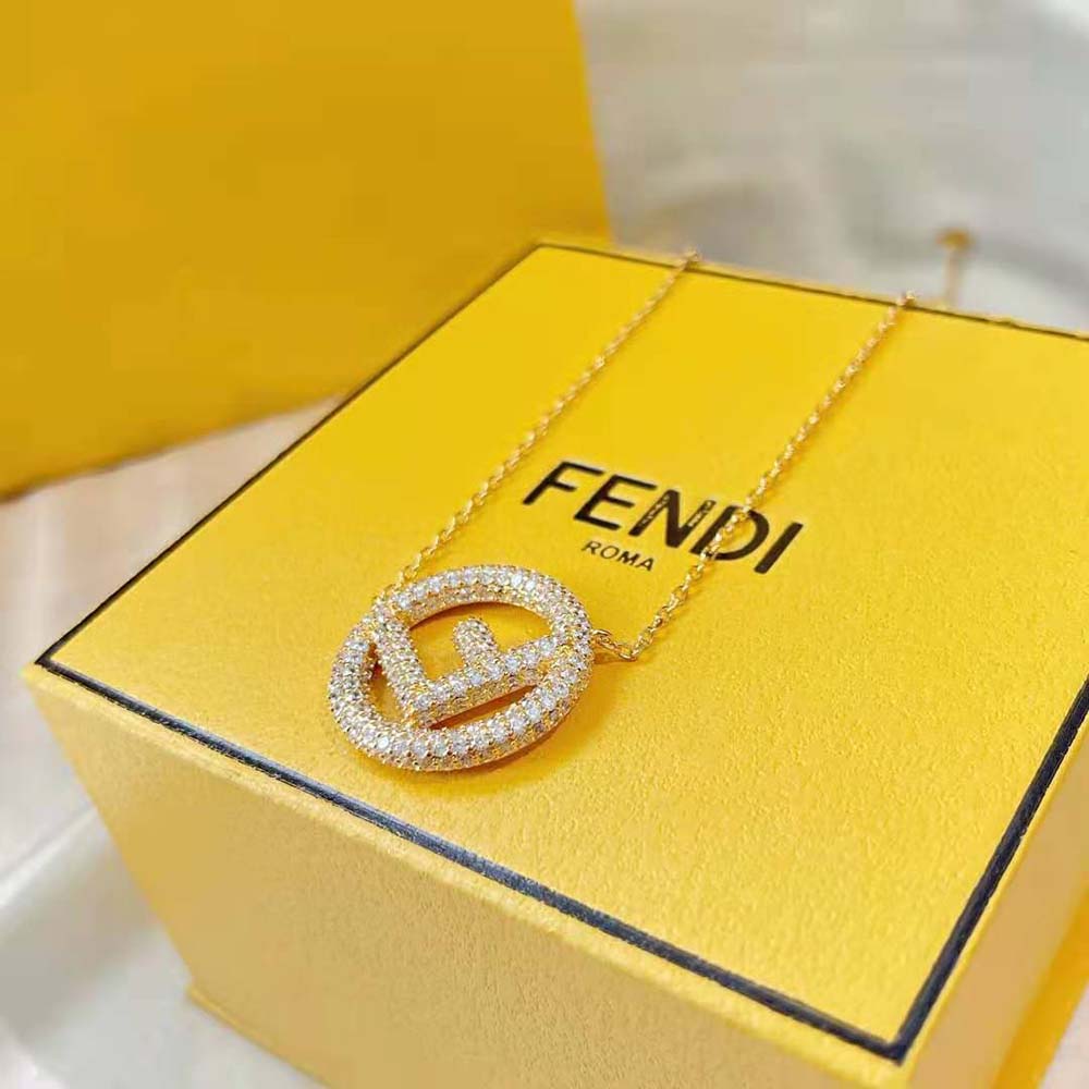 Side angle showing clasp and delicate gold links of Fendi necklace