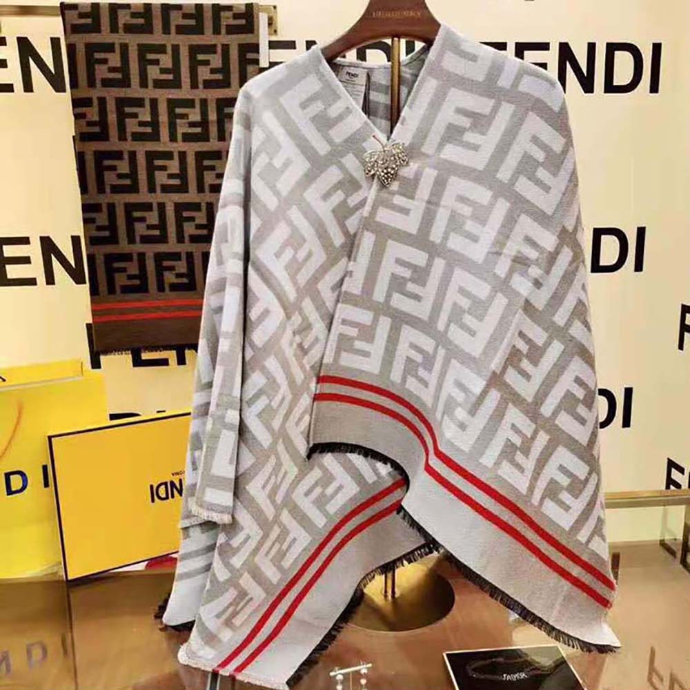 Close-up of embossed FF hardware on Fendi Women FF Poncho Multicolor