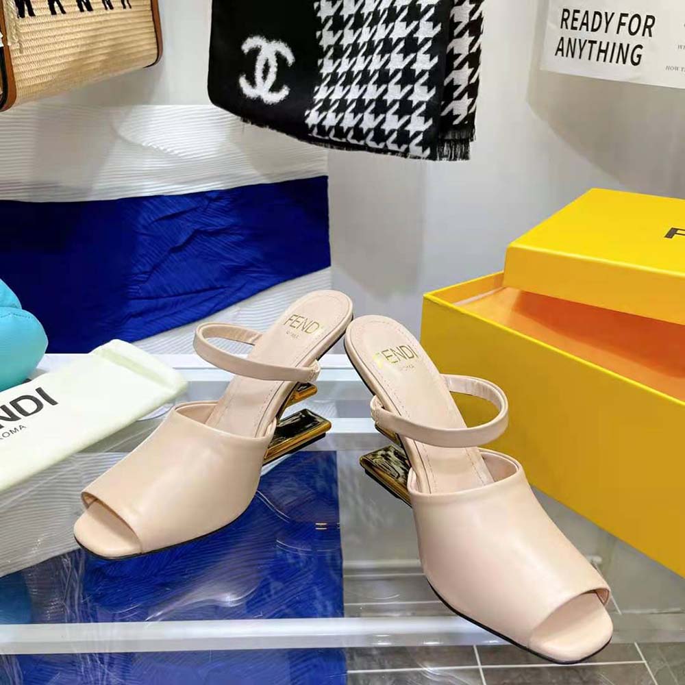 Overhead shot showing pink leather and heel of Fendi Women First sandals