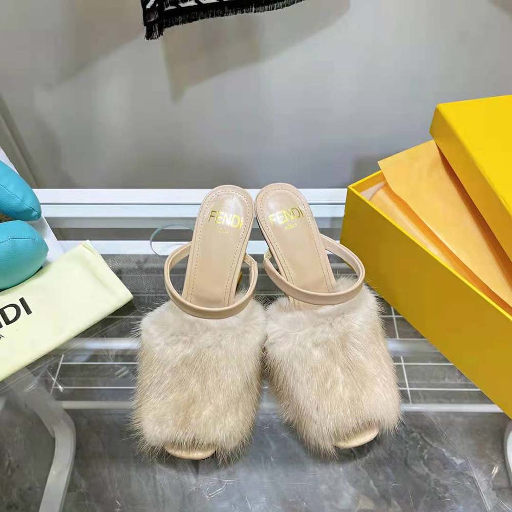 Close-up on pink mink fur and gold Fendi hardware detail