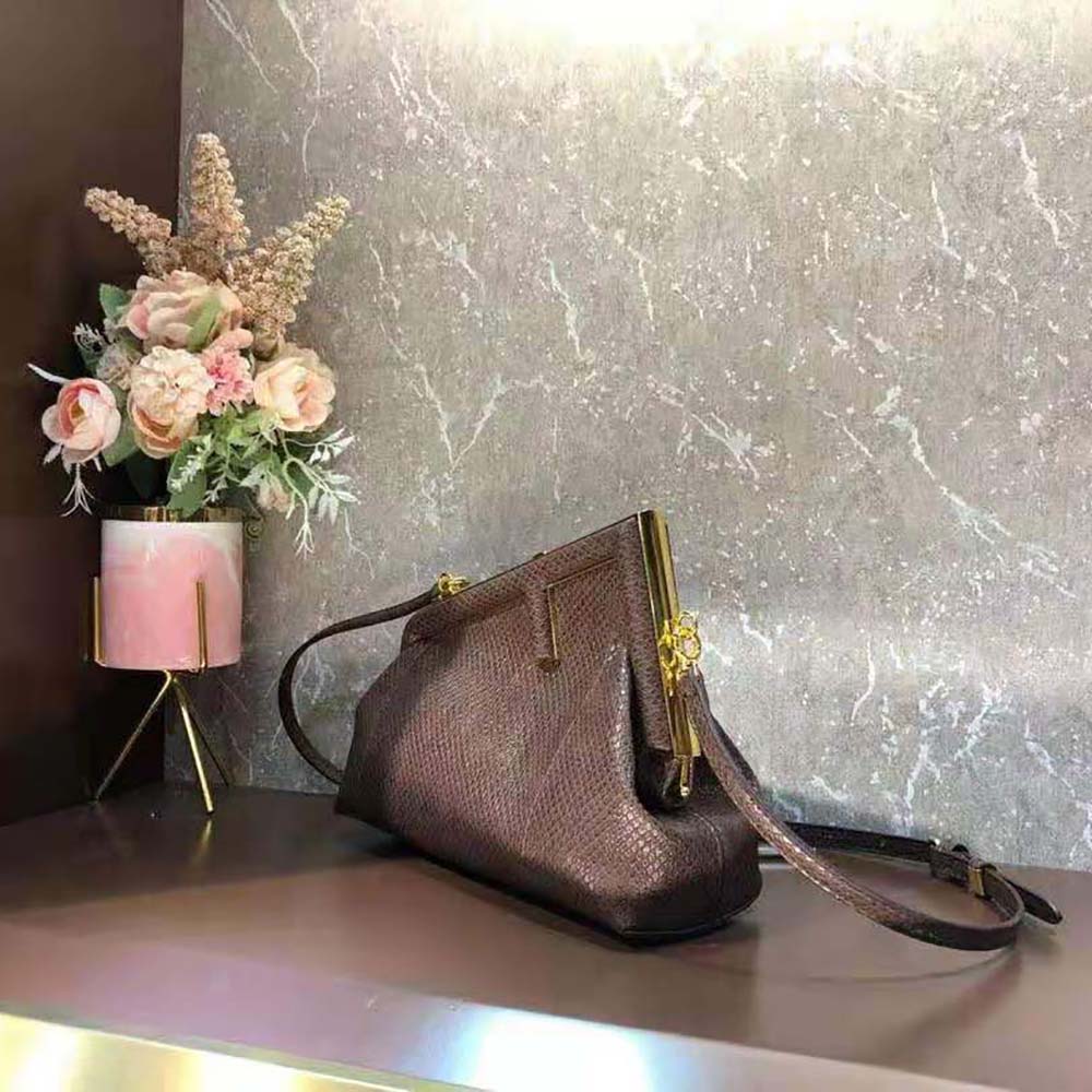Side angle showing python texture of Fendi Women First Small Brown Bag