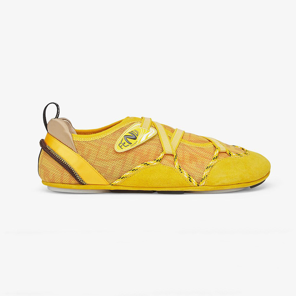 Side profile of Fendi Women Flex Yellow Suede Sneakers showing slip-on silhouette