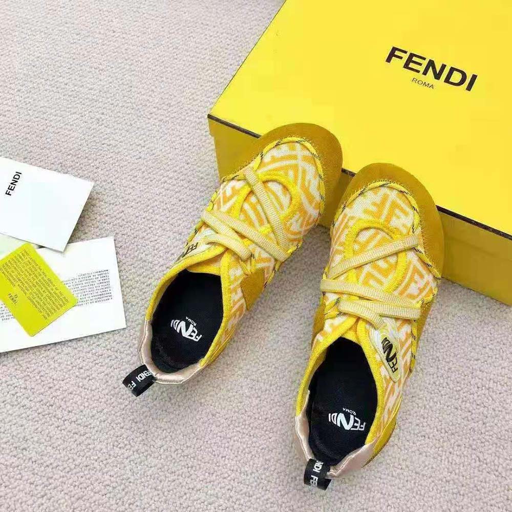 Top view of Fendi Women Flex Yellow Suede Sneakers highlighting flexible sole