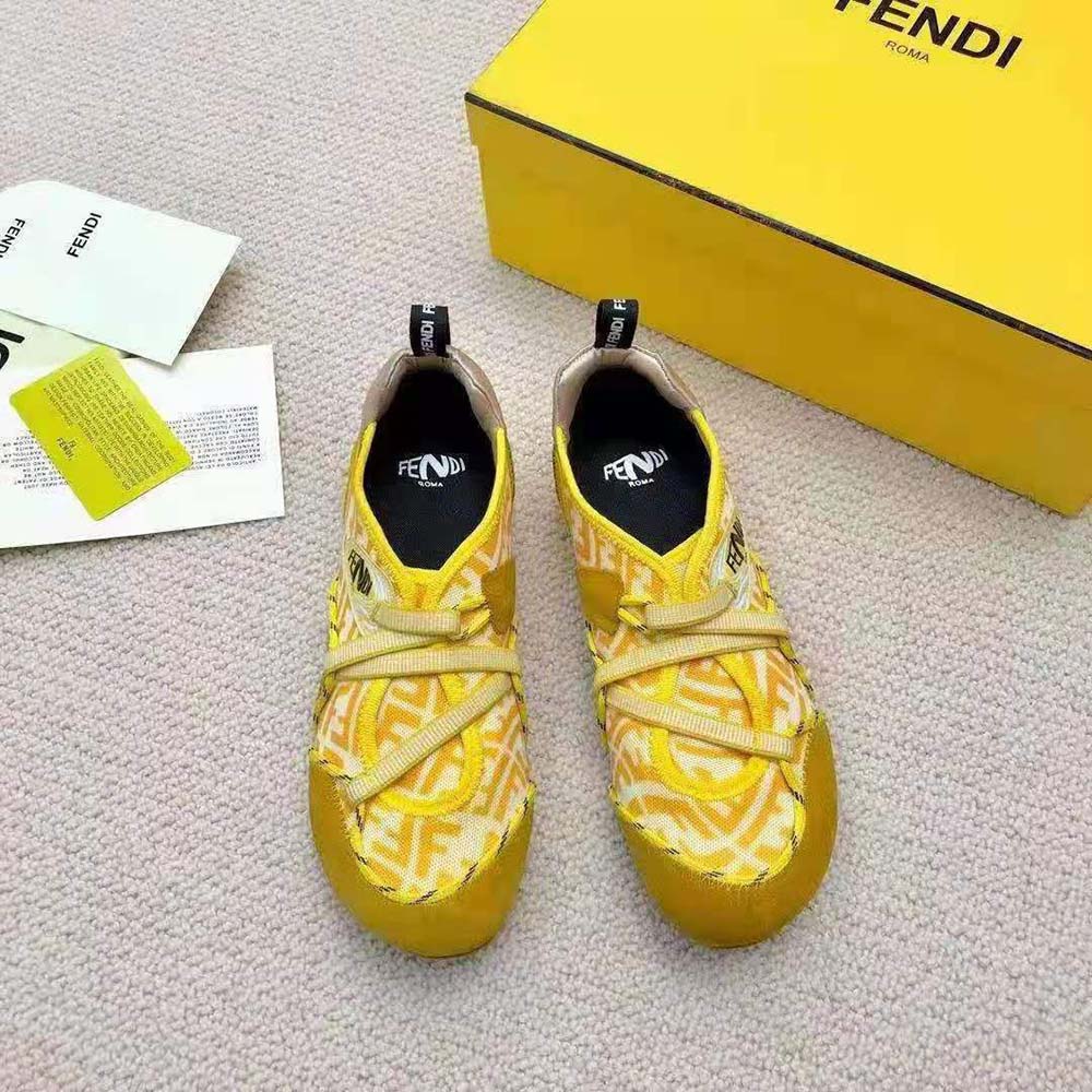 Close-up of yellow suede texture and subtle branding on Fendi Women Flex Sneakers