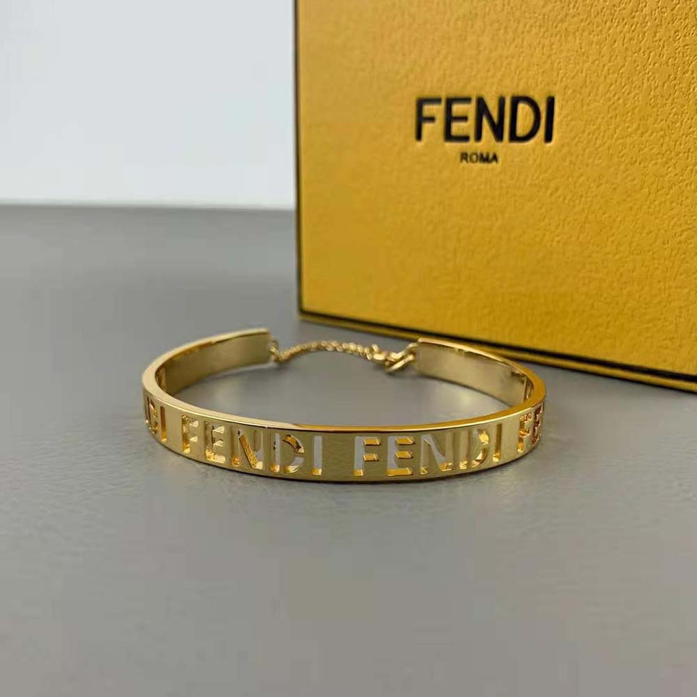 Side view of Fendi Women Gold-Colored Bracelet showing polished gold finish