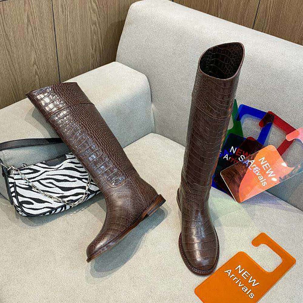 Front angle of Fendi Women Karligraphy Brown Leather Boots showcasing silhouette