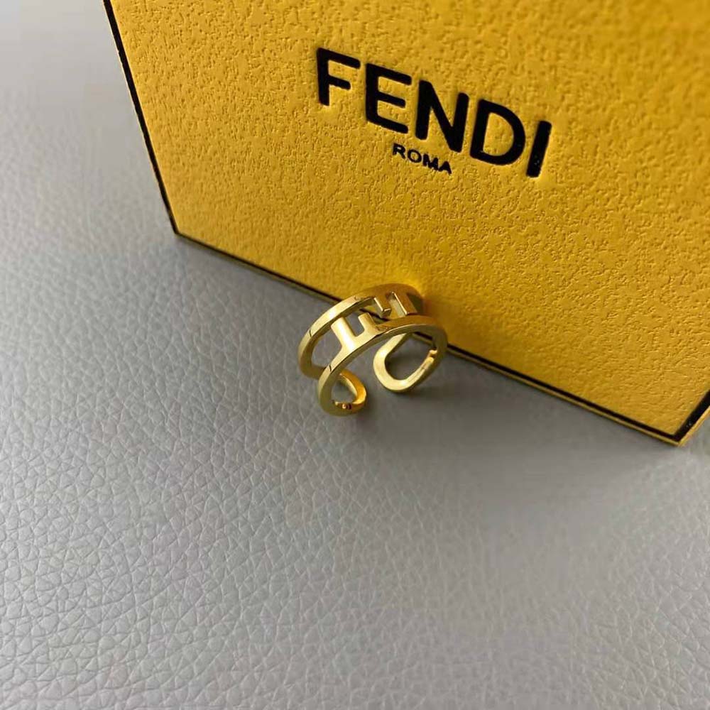 Side angle of Fendi Women O’lock Gold-Colored Ring highlighting O’lock hardware