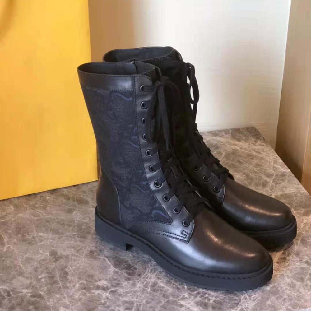 Top-down view showcasing leather texture on Fendi Women Signature Black Leather Biker Boots