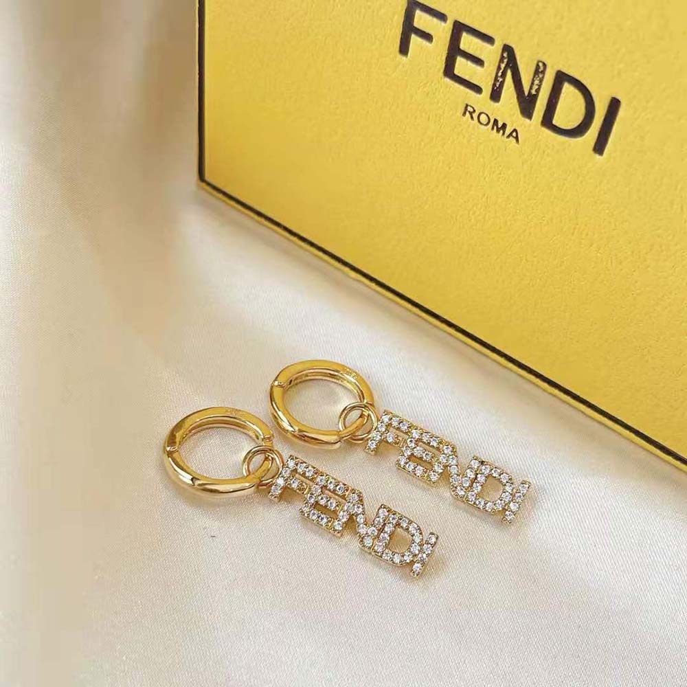Side angle showing Fendi Women Signature Gold-Colored Earrings clasp detail
