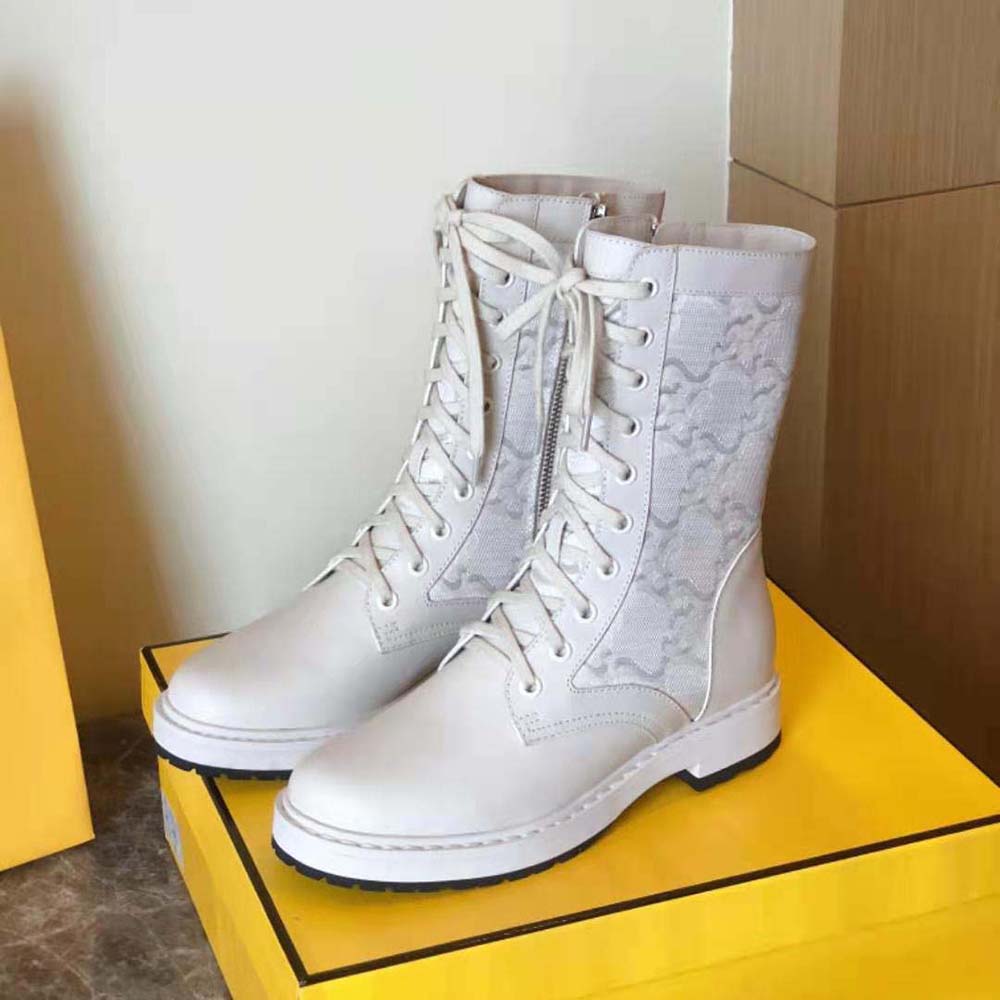 Front angle of Fendi Women Signature White Leather Biker Boots highlighting chunky sole