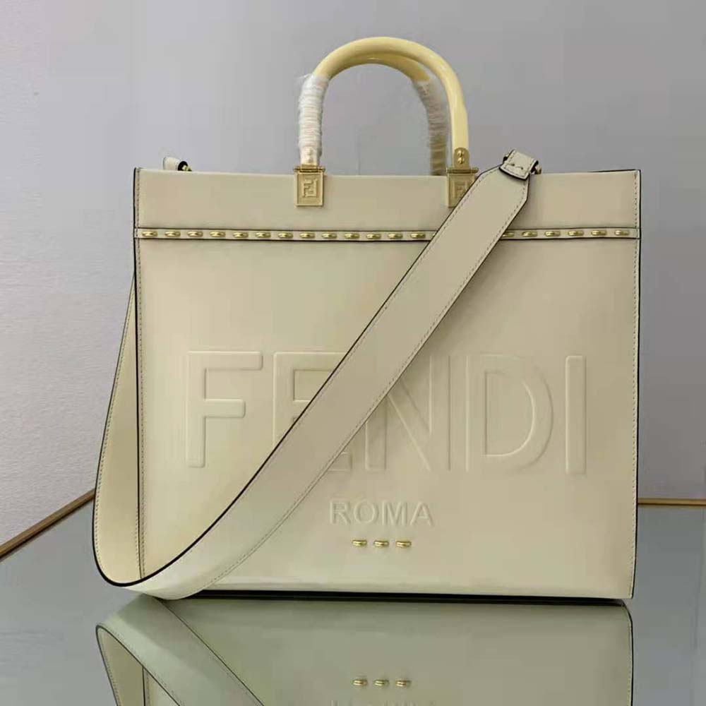Side angle showing spacious interior of Fendi Women Sunshine Medium White Leather Shopper