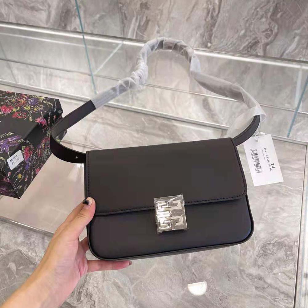 Close-up of silver 4G logo clasp on Givenchy Women Medium 4G Bag