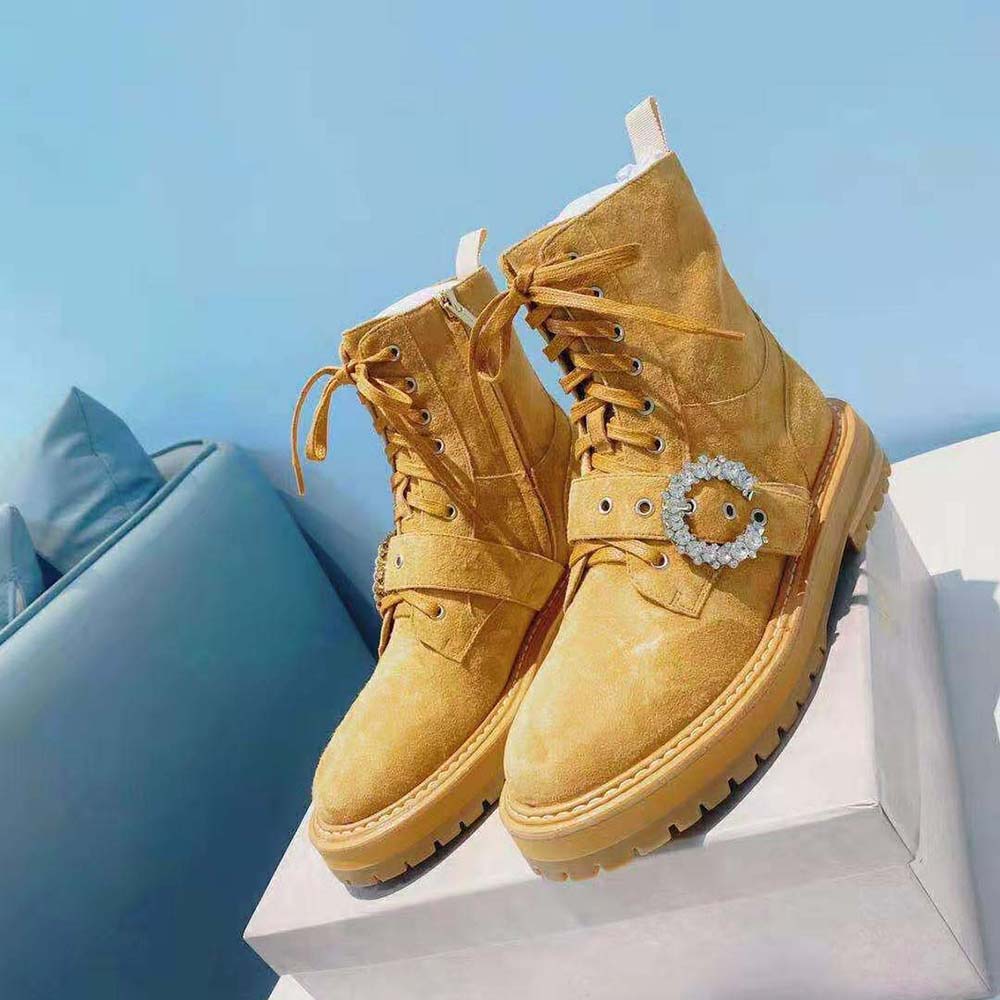 Top view showing lace closure of Jimmy Choo Women Cora suede combat boots