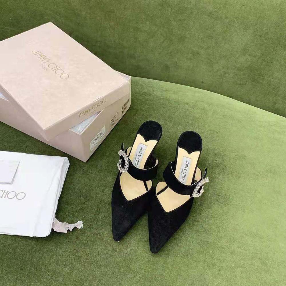 Close-up of crystal buckle detail on Jimmy Choo Women Marta 70 Black Suede Mules